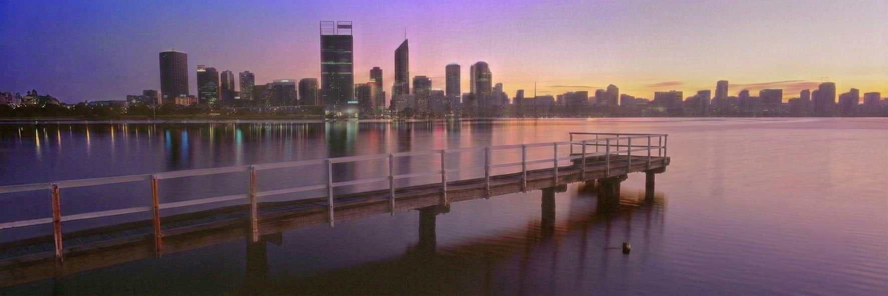 Perth city skyline at dusk, seen across the Swan River